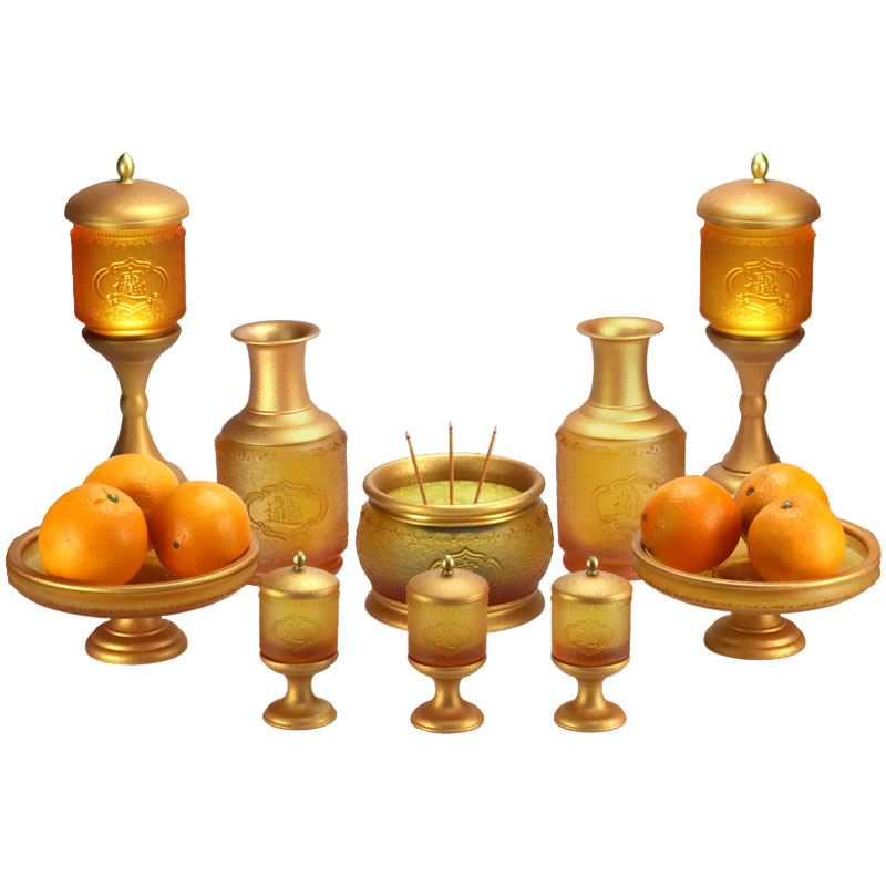 Glasoffer till det buddhistiska templet för att ge rikedom och skatter