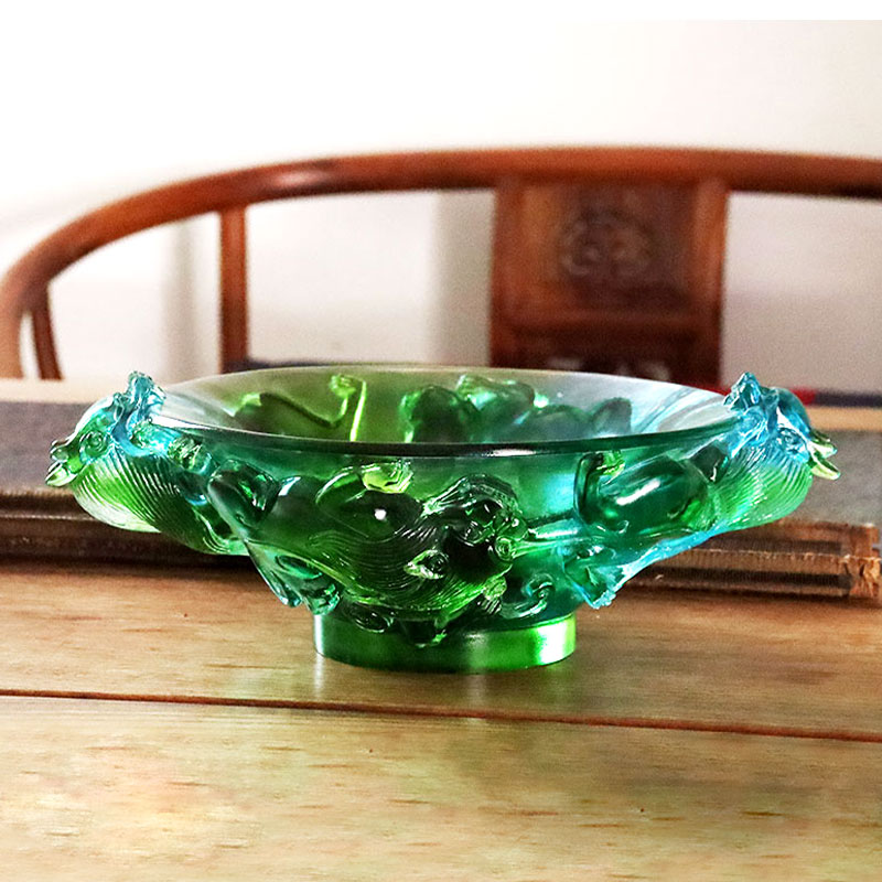 Transparent grön fruktfat i glas