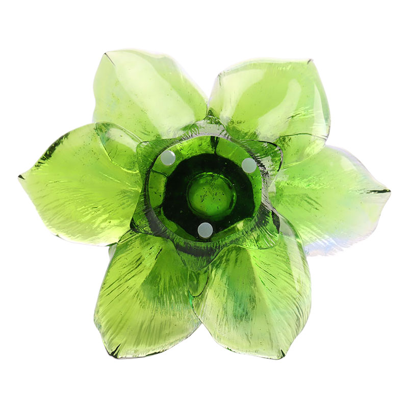 Kronbladsformad ljushållare av glas