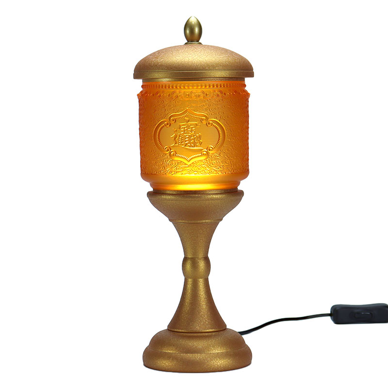 Glasoffer till det buddhistiska templet för att ge rikedom och skatter