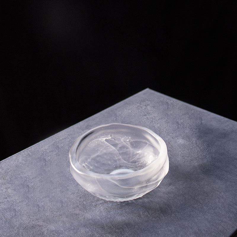 Transparent glas teservis med tekanna, tekopp