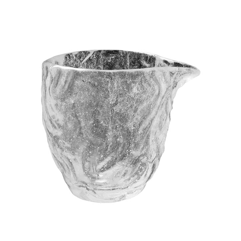 Bubbelmönster genomskinliga tekoppar av glas för användning på hemmakontoret