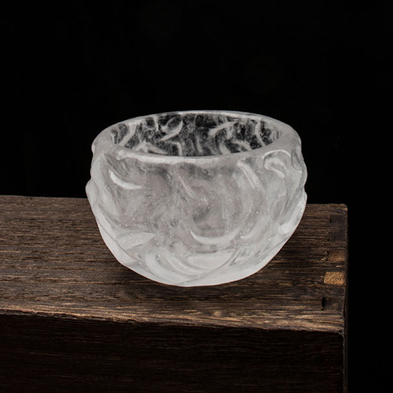 Bubbelmönster genomskinliga tekoppar av glas för användning på hemmakontoret